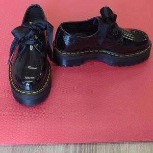 Low patent leather Doc Martens with ribbon laces